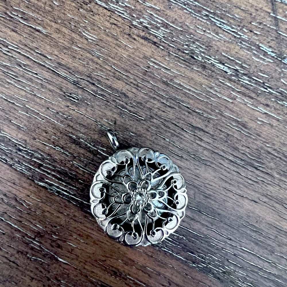 Origami Owl pendant with essential oil inside